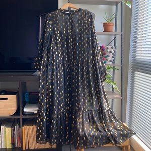 Black and gold tiered dress. Fits 16w-18w. Fully lined. I never wore item.